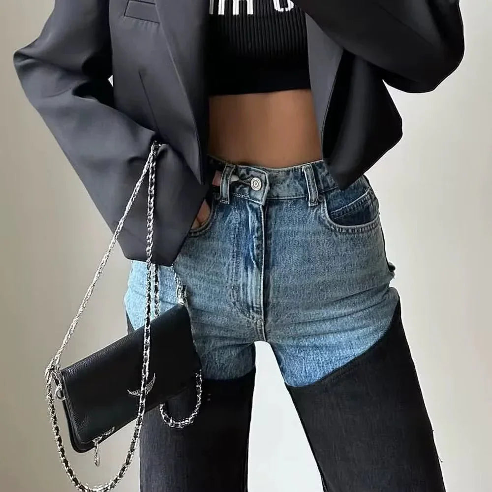 Women's high-waisted two-tone jeans with light blue upper panels and black straight legs