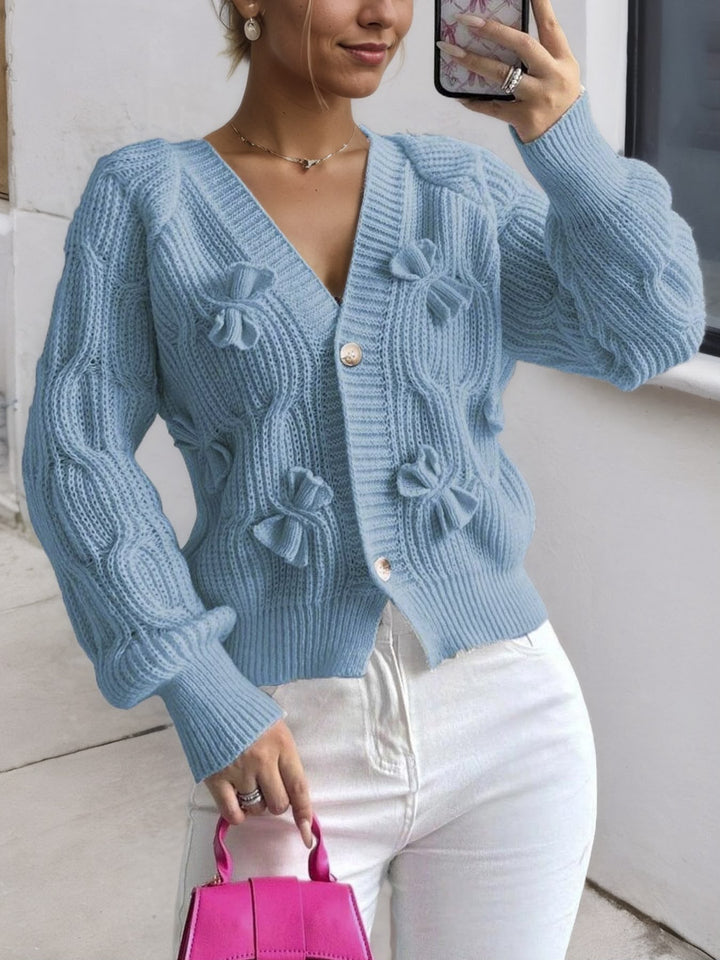 Women's ribbed knit cardigan with bow details, V-neckline and long sleeves