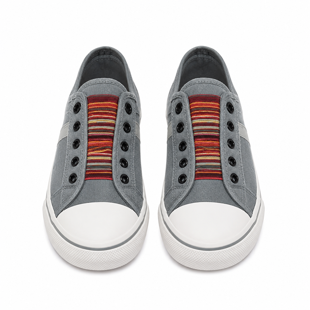Women's low-top slip-on sneakers with rounded toes, elastic striped gussets and flat white soles