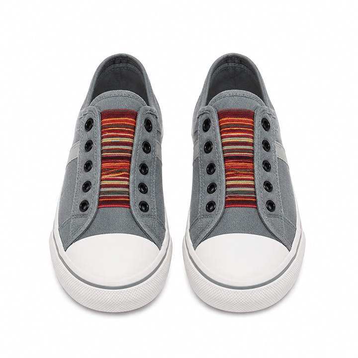 Women's low-top slip-on sneakers with rounded toes, elastic striped gussets and flat white soles