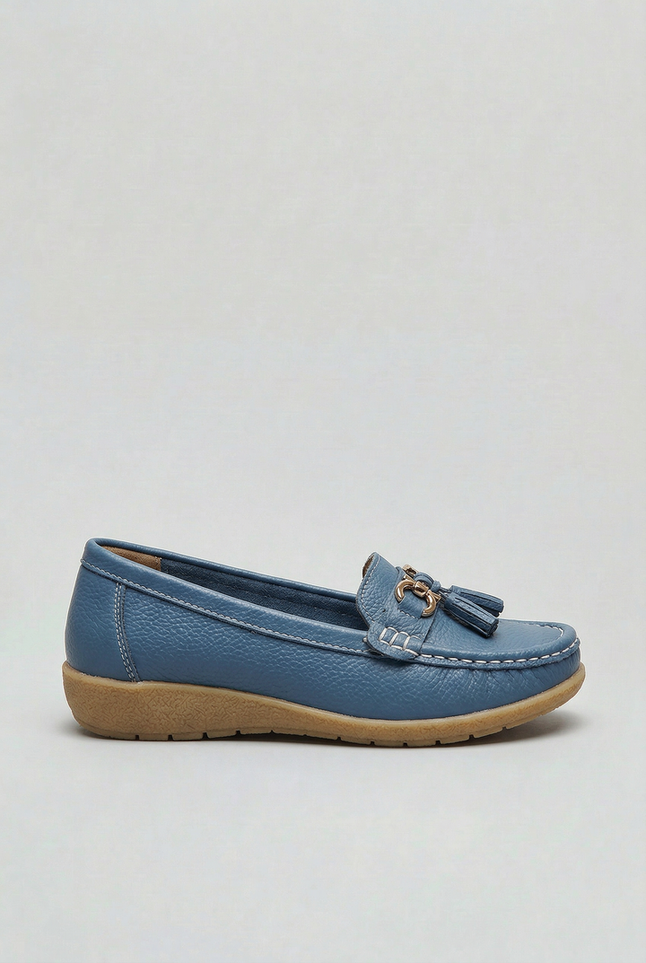 Women's slip-on loafers with round moc toe, tassel trim and low wedge sole