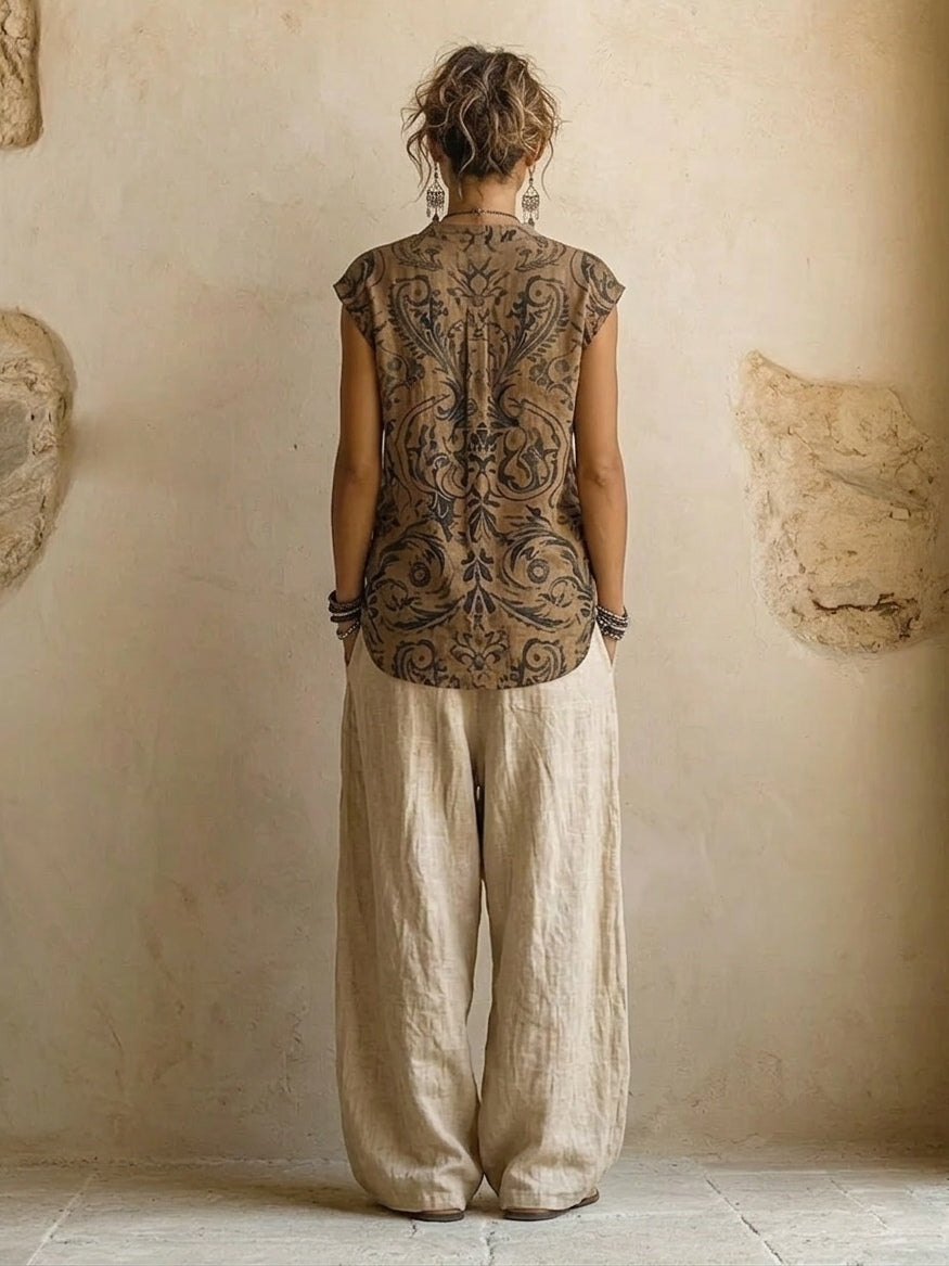 Women's beige three-piece outfit set with printed sleeveless top, long cardigan and wide-leg trousers