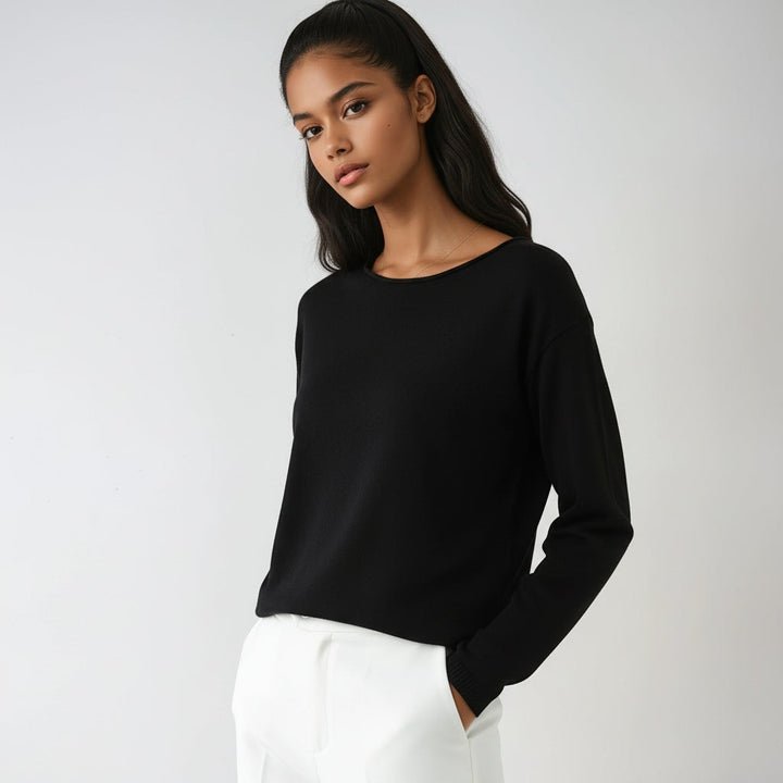 Women's fine knit crew neck sweater with long sleeves and ribbed trims