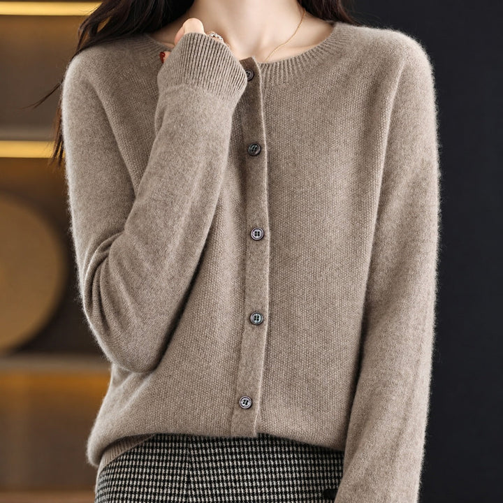 Women's long-sleeve button front cardigan with rounded neckline and ribbed trims