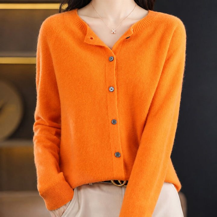 Women's long-sleeve button front cardigan with rounded neckline and ribbed trims