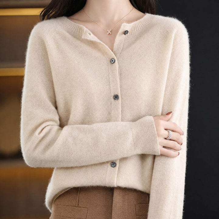 Women's long-sleeve button front cardigan with rounded neckline and ribbed trims