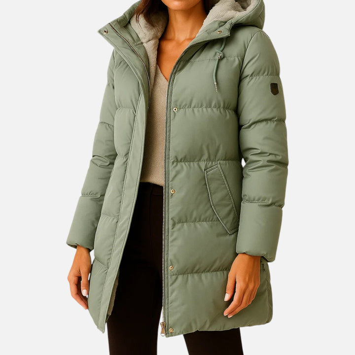 Women's hooded quilted puffer jacket with long sleeves and mid-thigh length