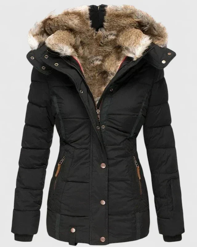 Women's quilted hooded winter coat with fur trim and zipped pockets