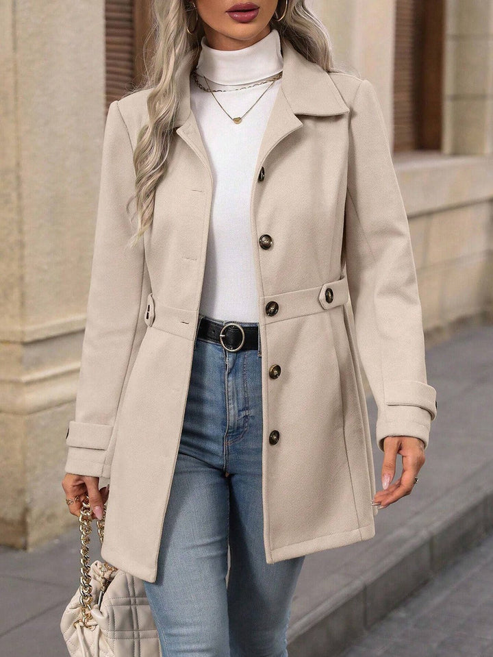 Women's belted trench coat with notched lapel, long sleeves and button front