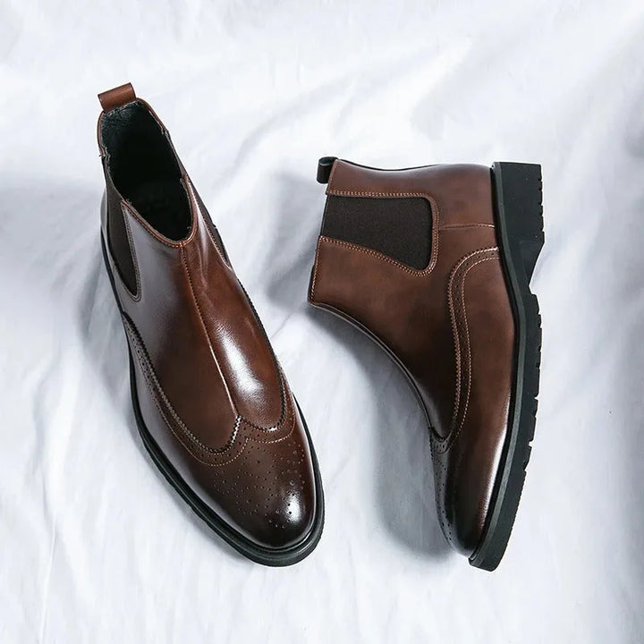 Chelsea boots with brogue detailing, elastic side panels and lug soles