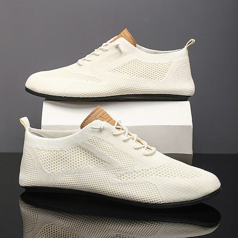 Knit lace-up shoes with round toes, flat soles and heel pull tabs