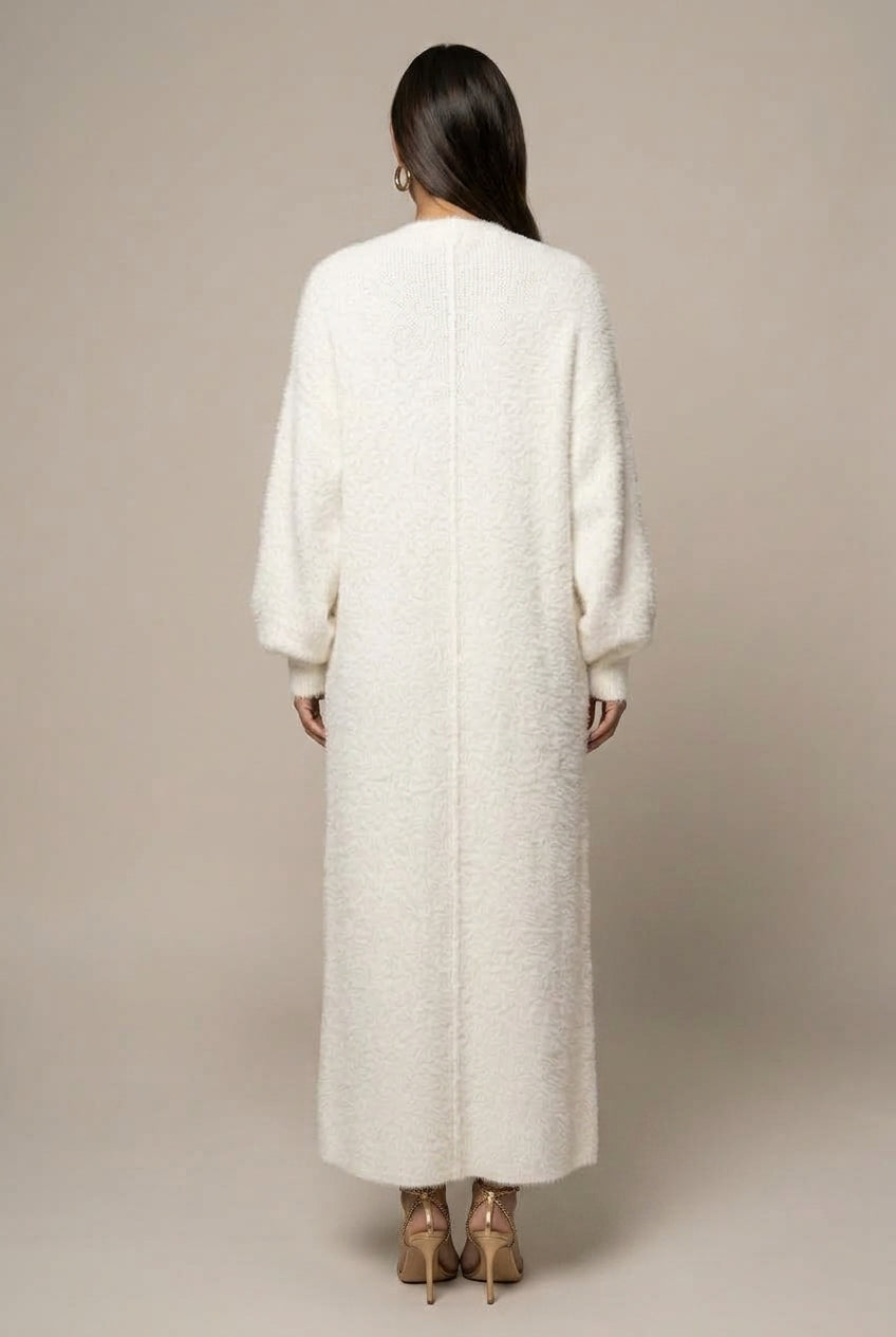 Women's long faux fur cardigan with open front and full-length silhouette