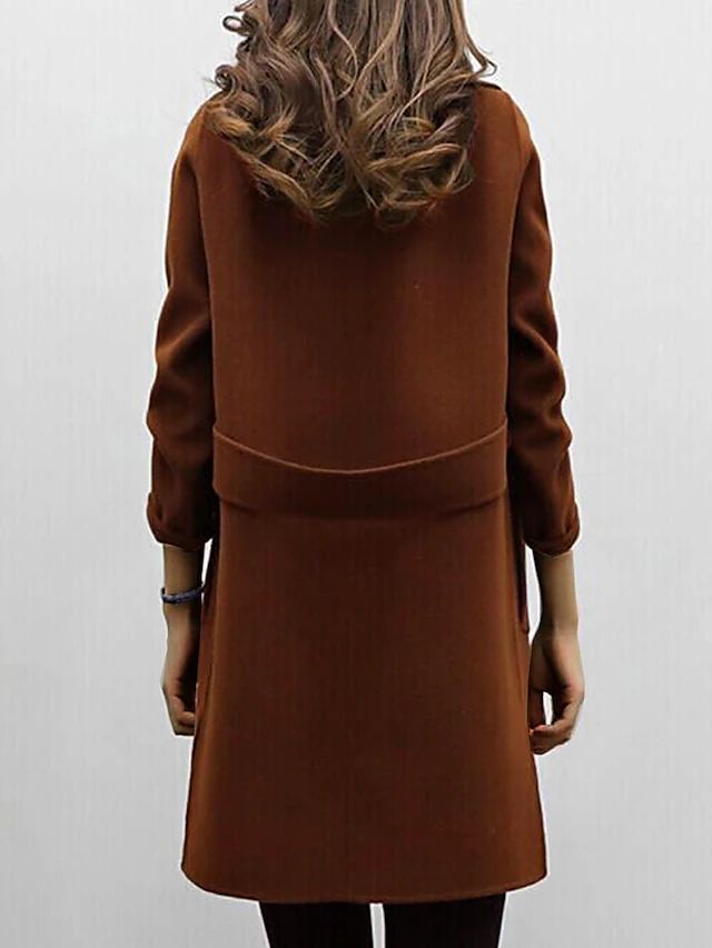Women's long button front coat with wide lapels and long sleeves