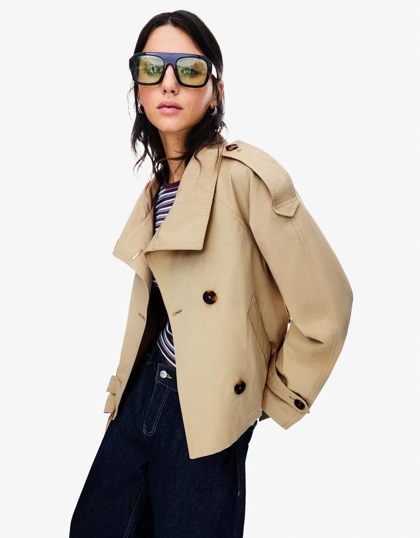 Women's short double-breasted trench coat with tie belt and high collar