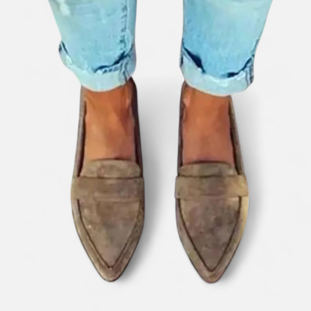 Women's pointed slip-on loafers with penny straps and low heels