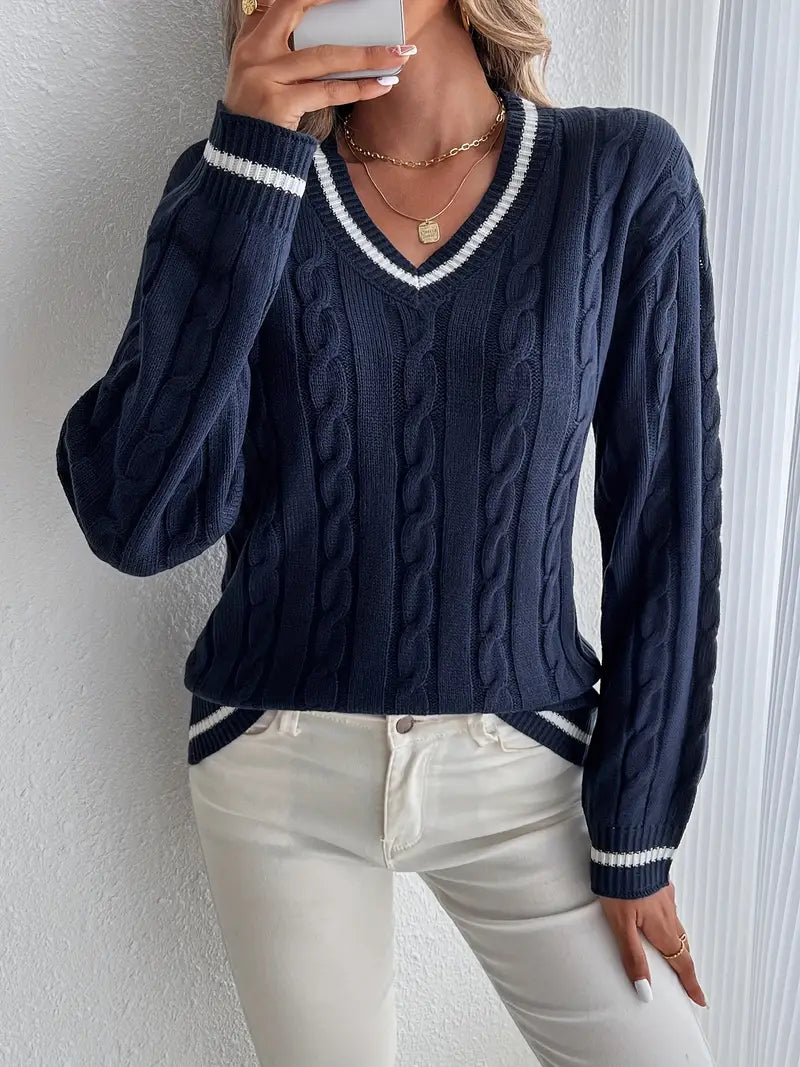 Women's navy cable knit V-neck sweater with white striped trim