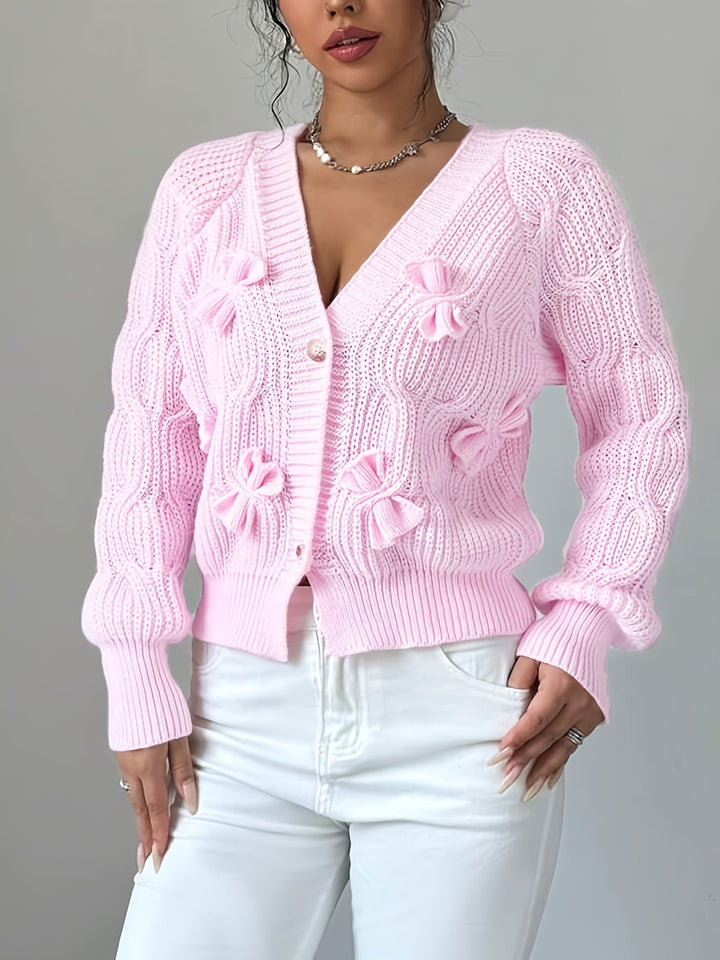 Women's ribbed knit cardigan with bow details, V-neckline and long sleeves