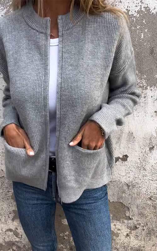 Women's ribbed knit jacket with stand collar, front zipper and patch pockets