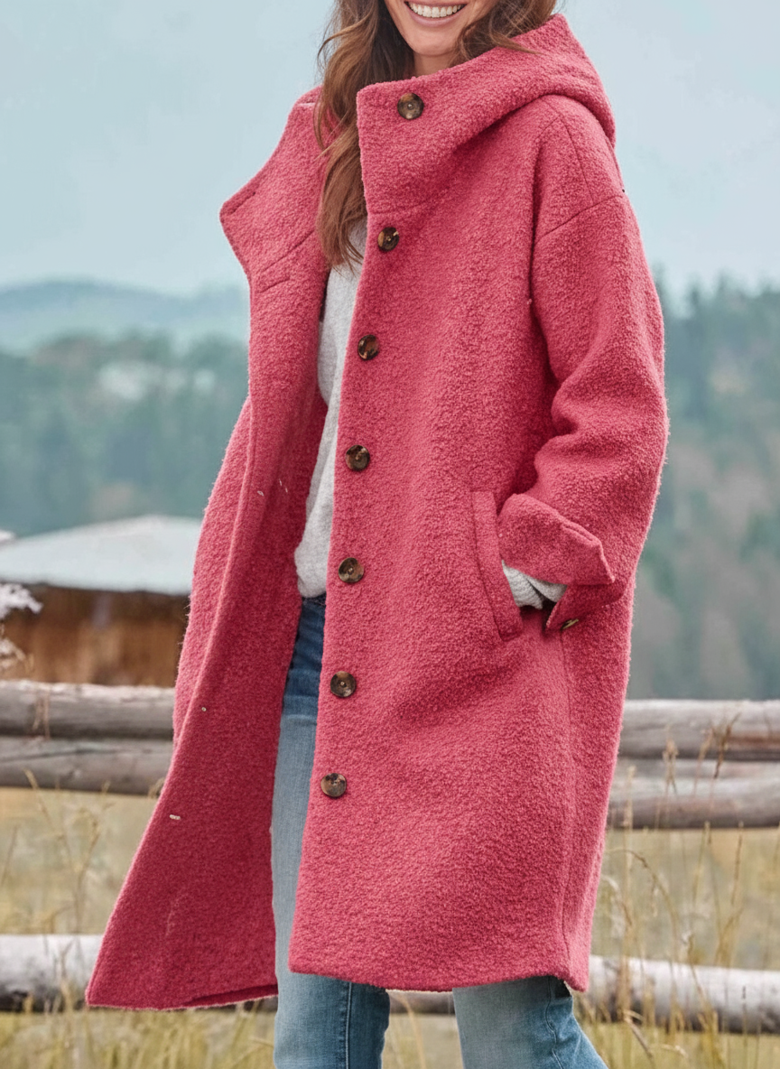 Women's longline textured hooded coat with button front and side pockets