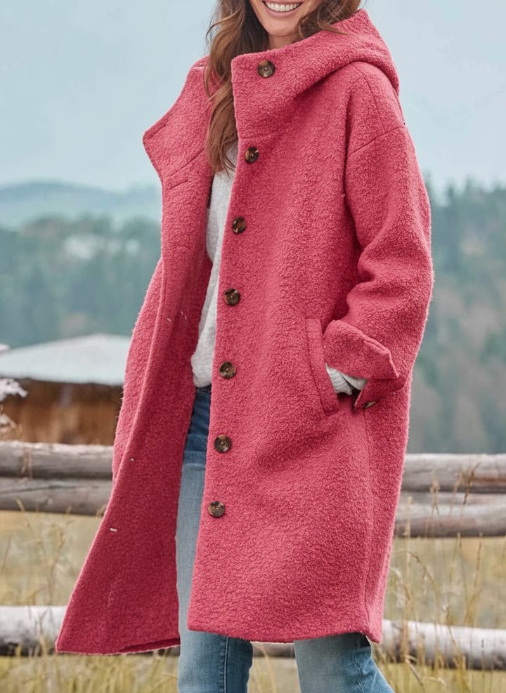 Women's longline textured hooded coat with button front and side pockets