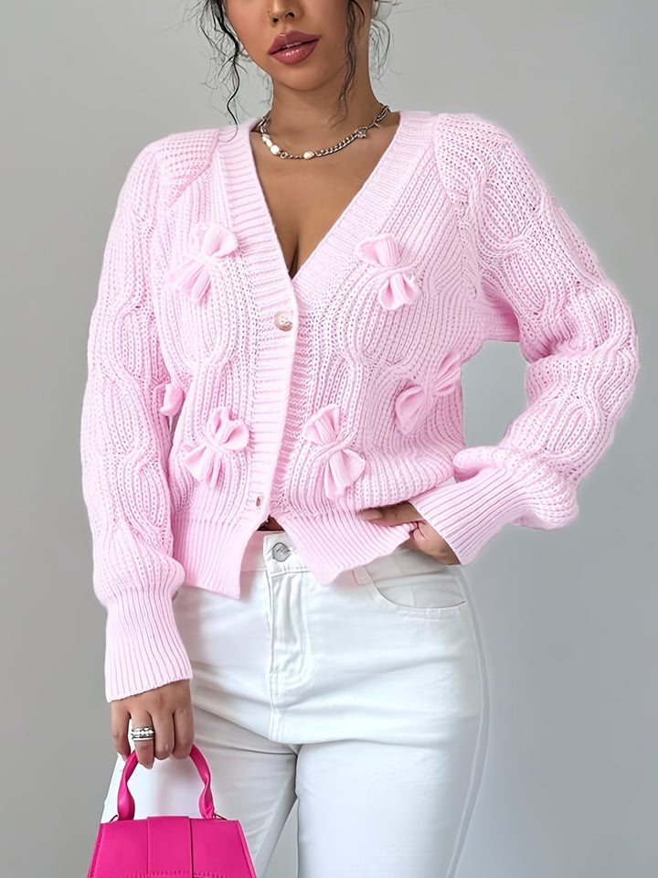 Women's ribbed knit cardigan with bow details, V-neckline and long sleeves