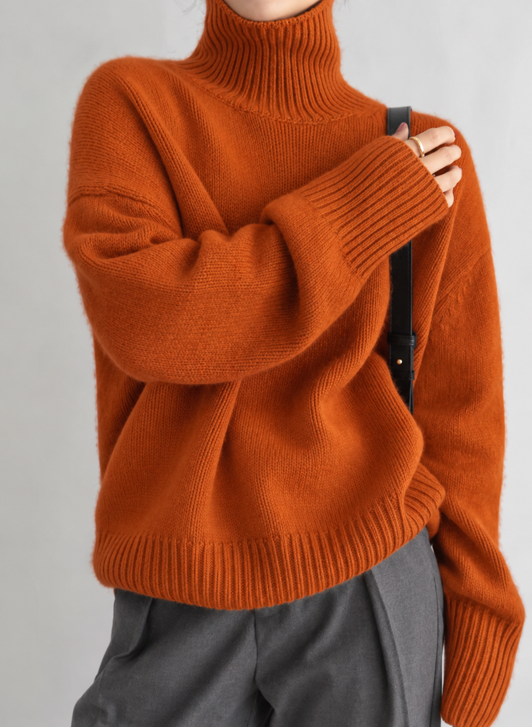 Women's relaxed turtleneck pullover sweater with long sleeves and ribbed trims