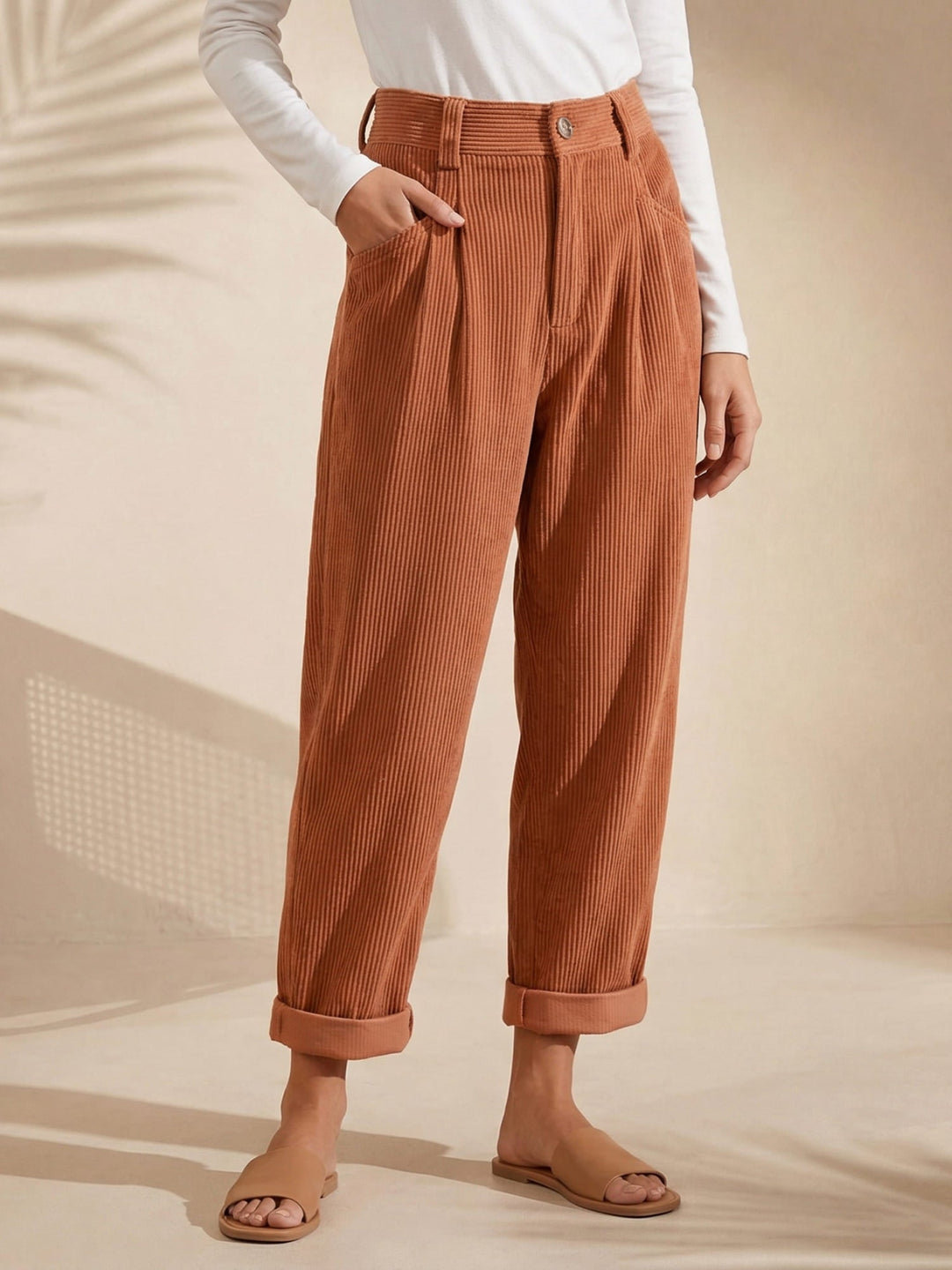 Women's high-waist corduroy trousers with straight legs, side pockets and cuffed hems