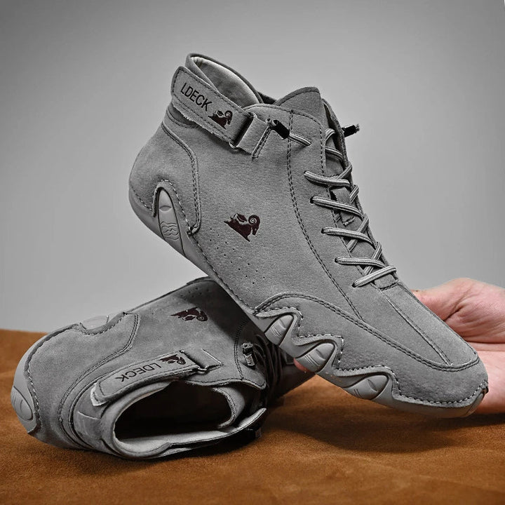 Unisex lace-up ankle boots with hook-and-loop strap and treaded sole