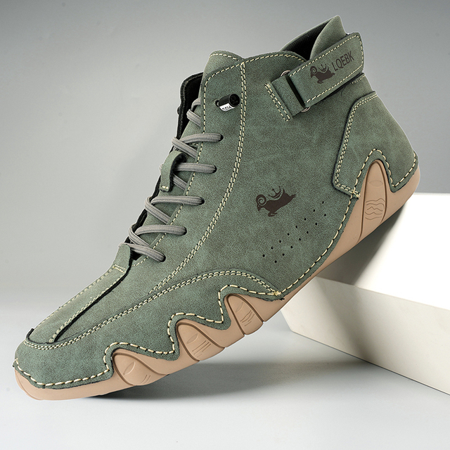 Unisex lace-up ankle boots with hook-and-loop strap and treaded sole