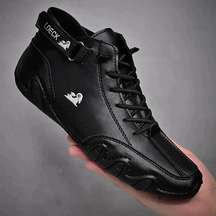 Unisex lace-up ankle boots with hook-and-loop strap and treaded sole