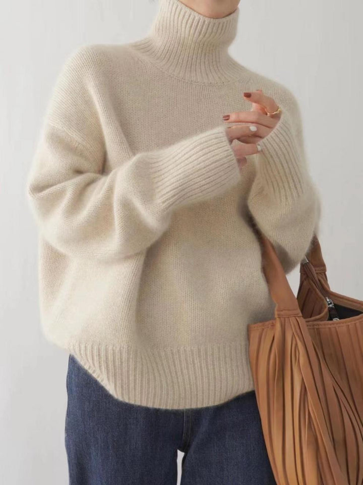 Women's ribbed turtleneck sweater with long sleeves and dropped shoulders