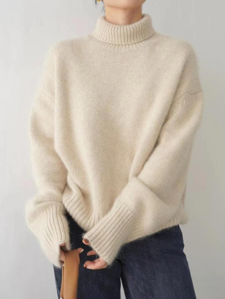 Women's ribbed turtleneck sweater with long sleeves and dropped shoulders