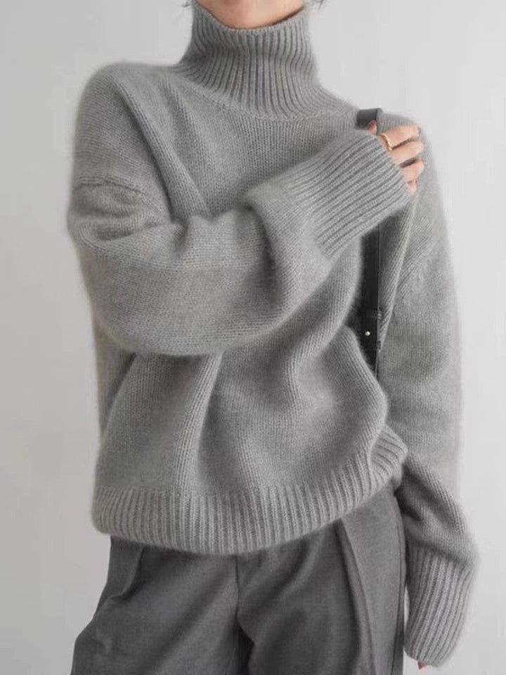 Women's ribbed turtleneck sweater with long sleeves and dropped shoulders