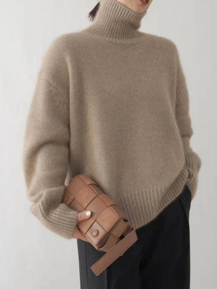 Women's ribbed turtleneck sweater with long sleeves and dropped shoulders