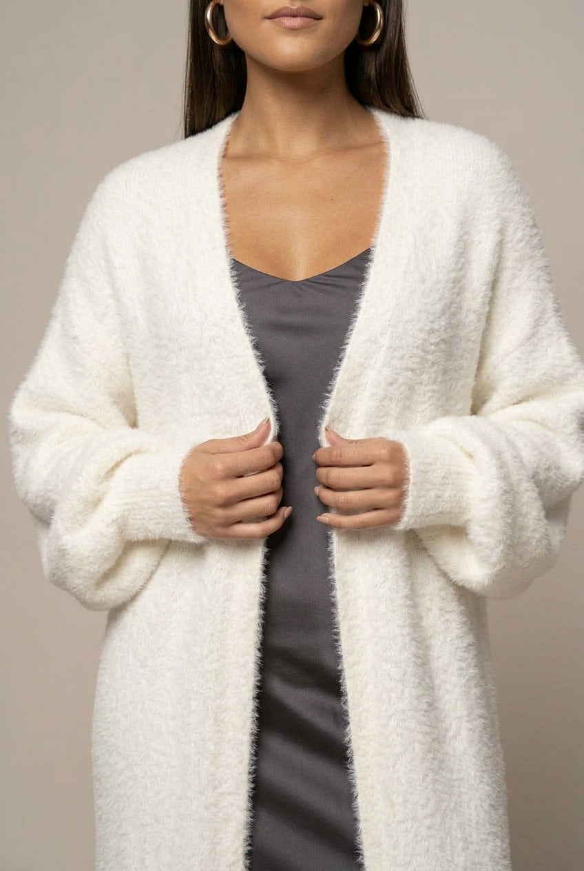 Women's long faux fur cardigan with open front and full-length silhouette