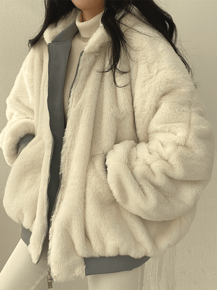 Women's reversible hooded bomber jacket with plush lining and zip front