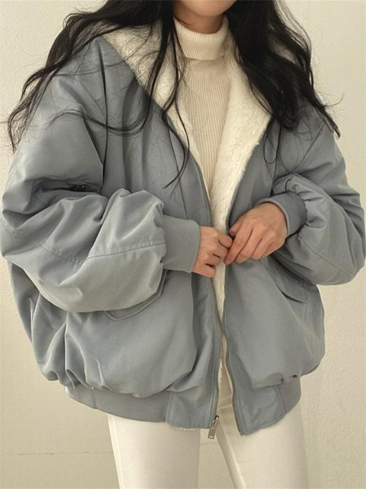 Women's reversible hooded bomber jacket with plush lining and zip front
