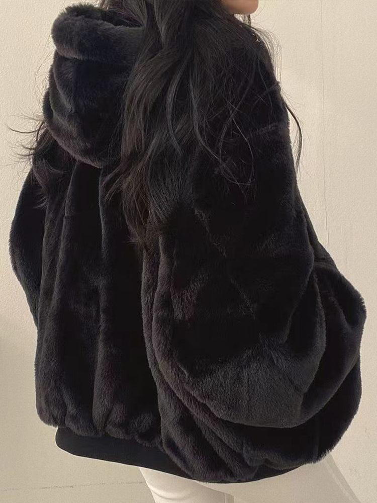 Women's reversible hooded bomber jacket with plush lining and zip front