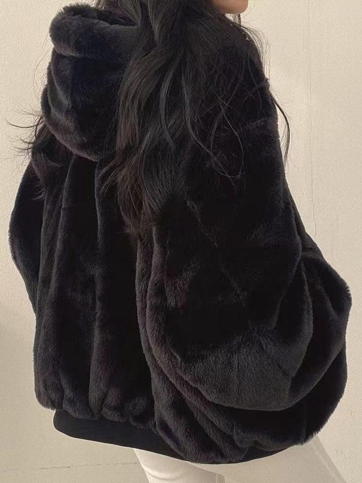 Women's reversible hooded bomber jacket with plush lining and zip front