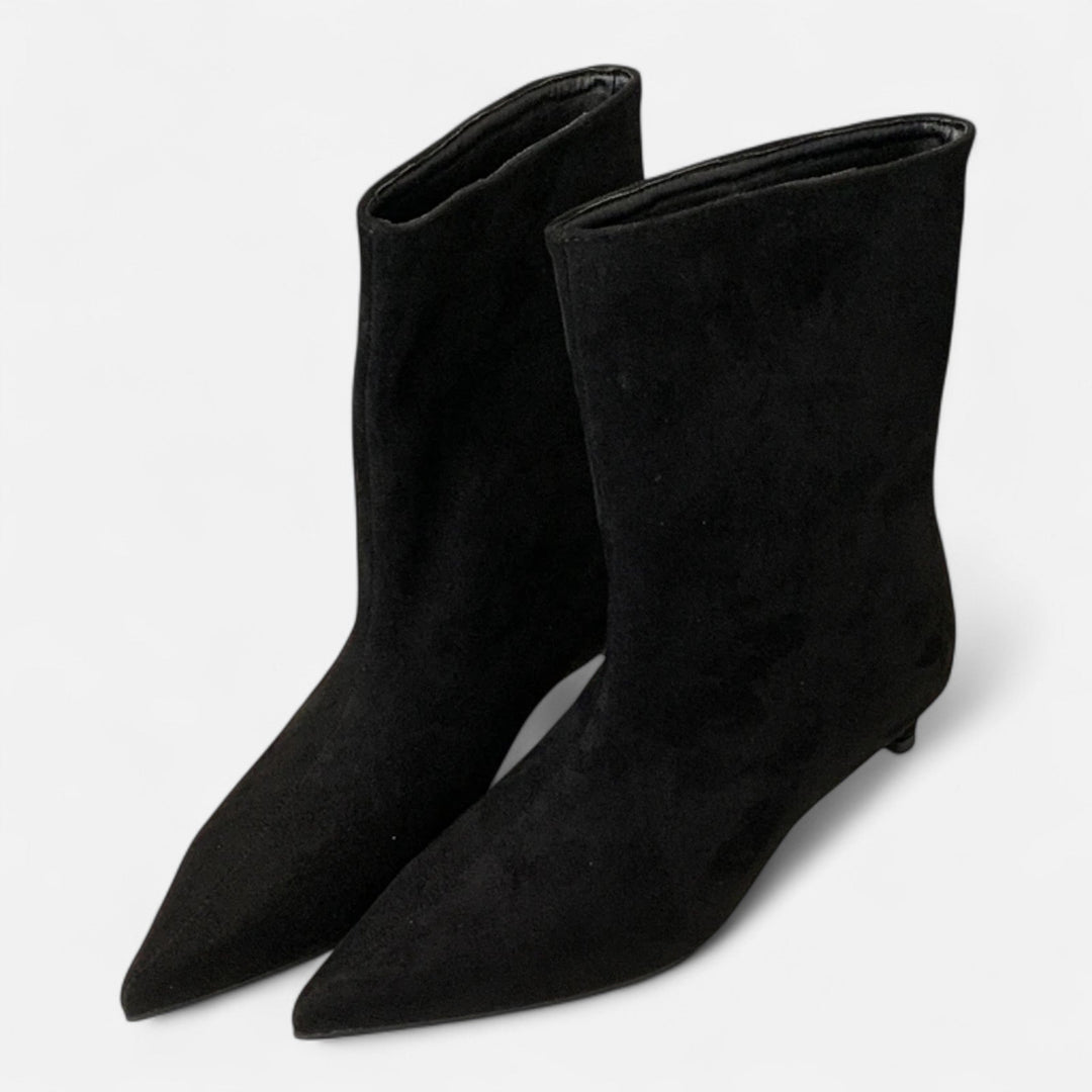 Women's pointed-toe ankle boots with low heels and slip-on shafts