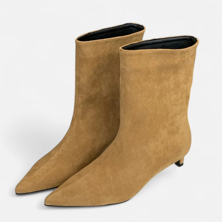 Women's pointed-toe ankle boots with low heels and slip-on shafts