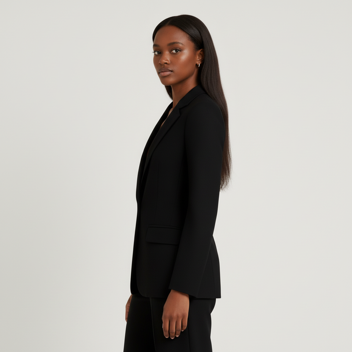Women's tailored blazer and trousers suit set with notched lapels and flap pockets