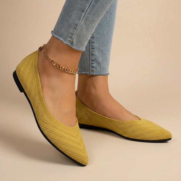 Women's pointed slip-on flats with textured knit uppers and low flat heels