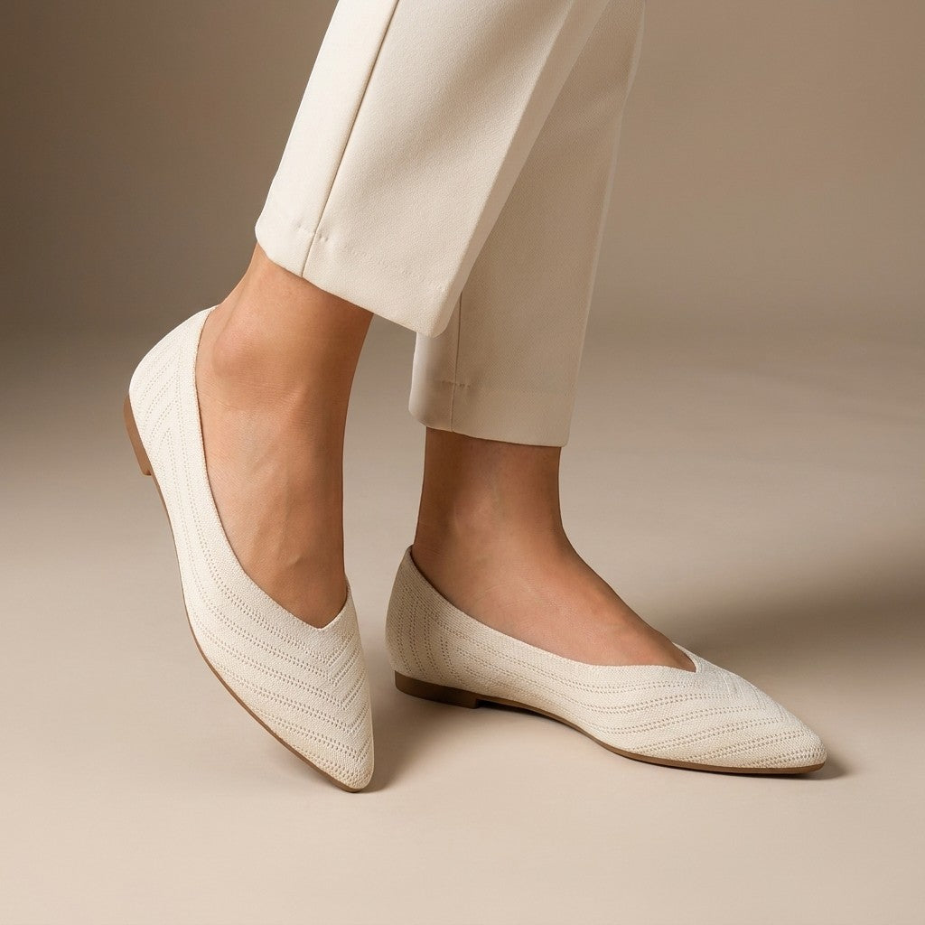 Women's pointed slip-on flats with textured knit uppers and low flat heels
