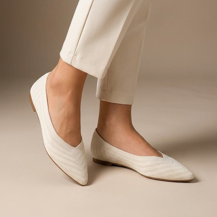 Women's pointed slip-on flats with textured knit uppers and low flat heels