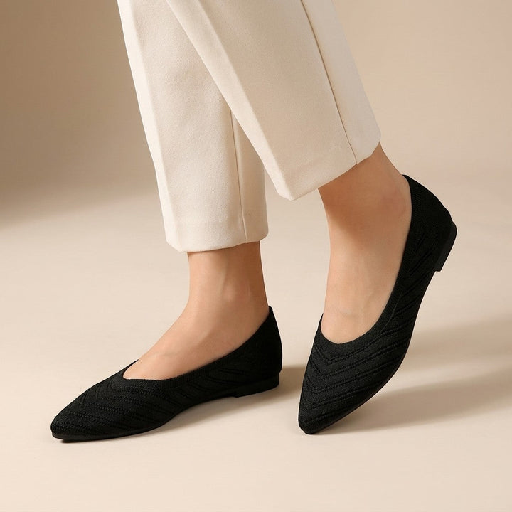 Women's pointed slip-on flats with textured knit uppers and low flat heels
