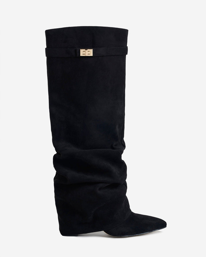 Black women's slouchy knee-high boots with pointed toes and buckle straps