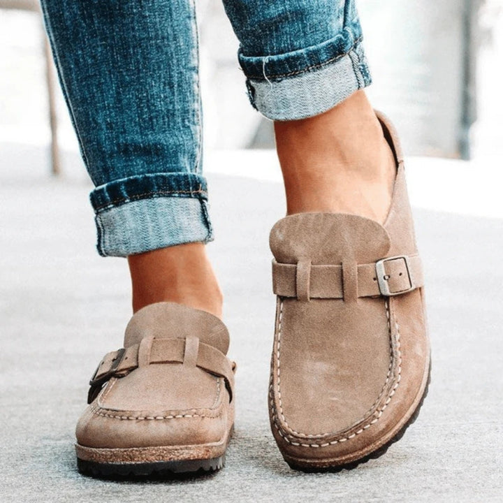 Women's buckle loafers with round moc toes, stitched edging and flat soles