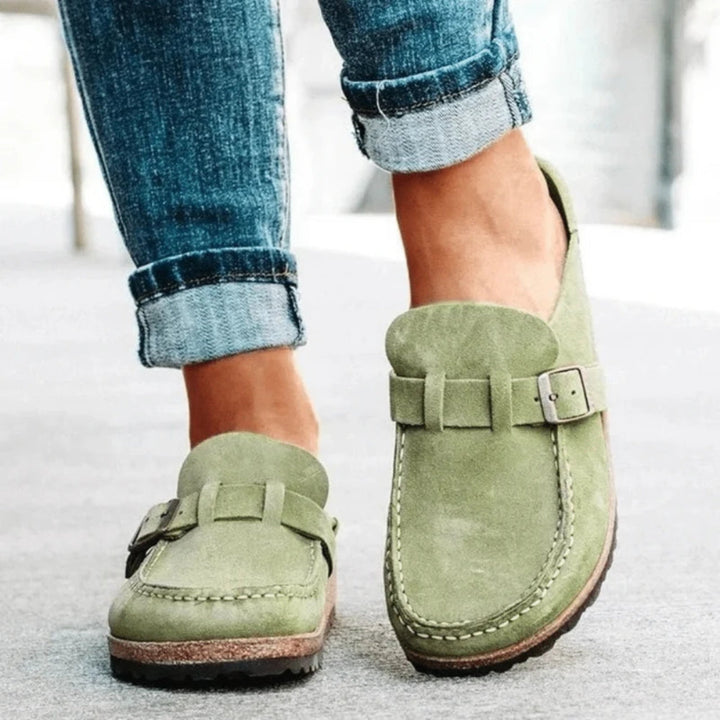 Women's buckle loafers with round moc toes, stitched edging and flat soles