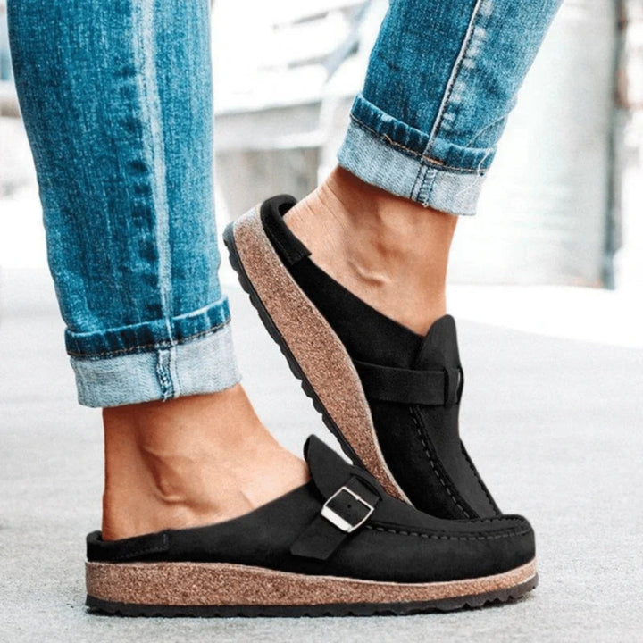 Women's buckle loafers with round moc toes, stitched edging and flat soles